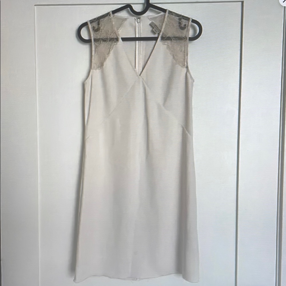 Elegant Cream Sleeveless Dress